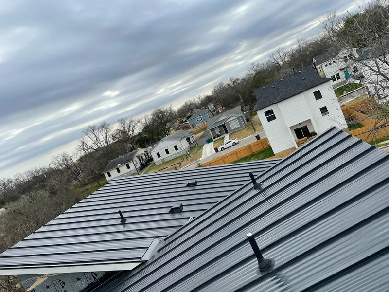 Standing seam metal roof panels with vents for Skylight Repair in Posen